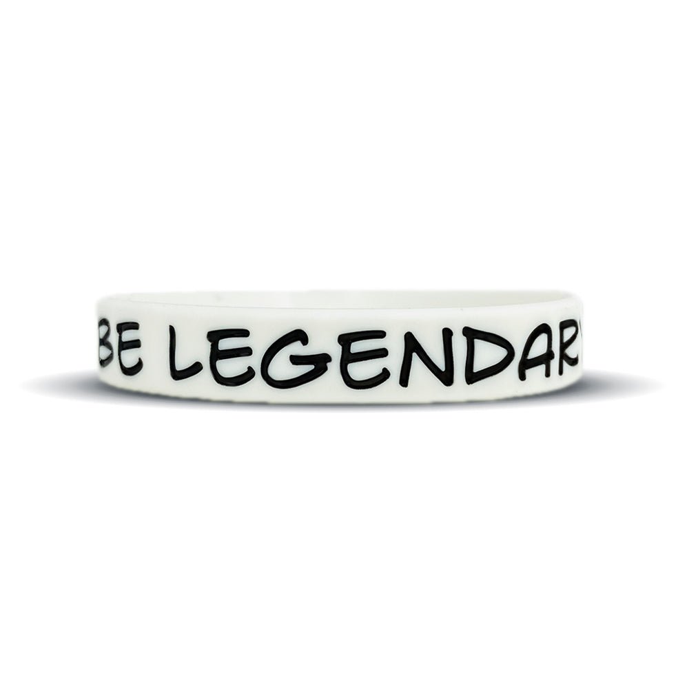 White wristband with 'BE LEGENDAR' text on a white background