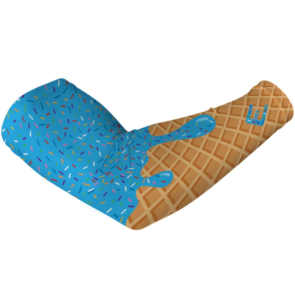 Waffle cone with blue ice cream and colorful sprinkles on a white background