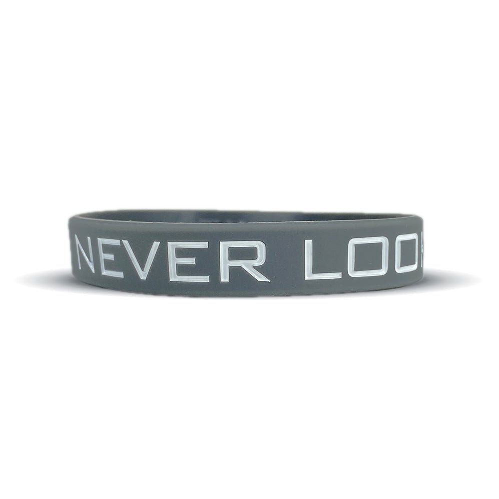 Gray wristband with 'NEVER LOOK' text on a white background