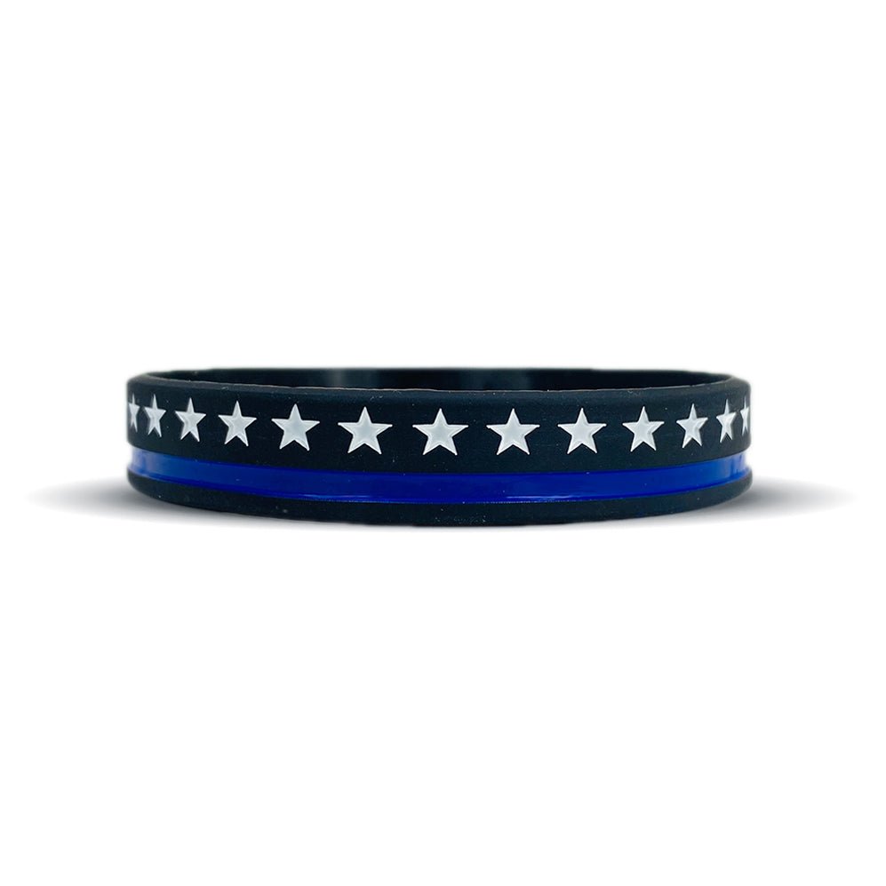 Black wristband with white stars and a thin blue stripe on a white background