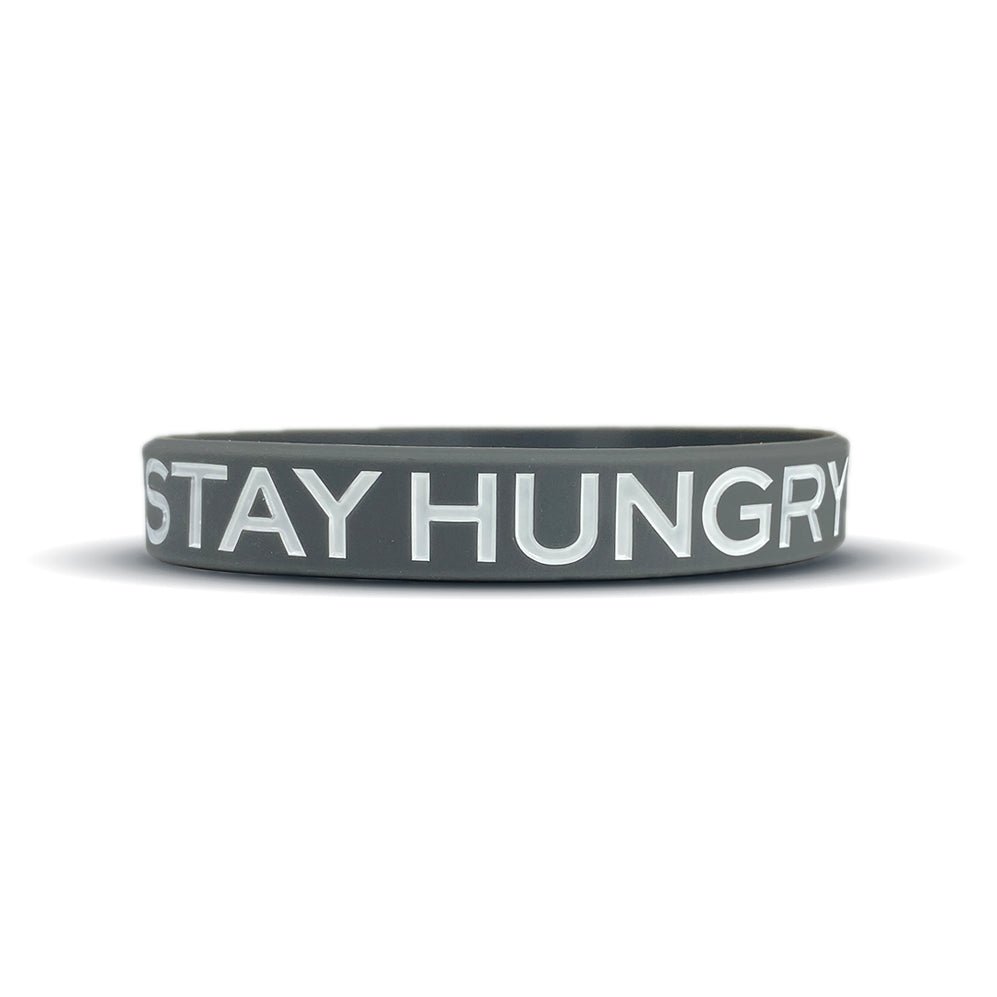 Gray wristband with 'STAY HUNGRY' text on a white background
