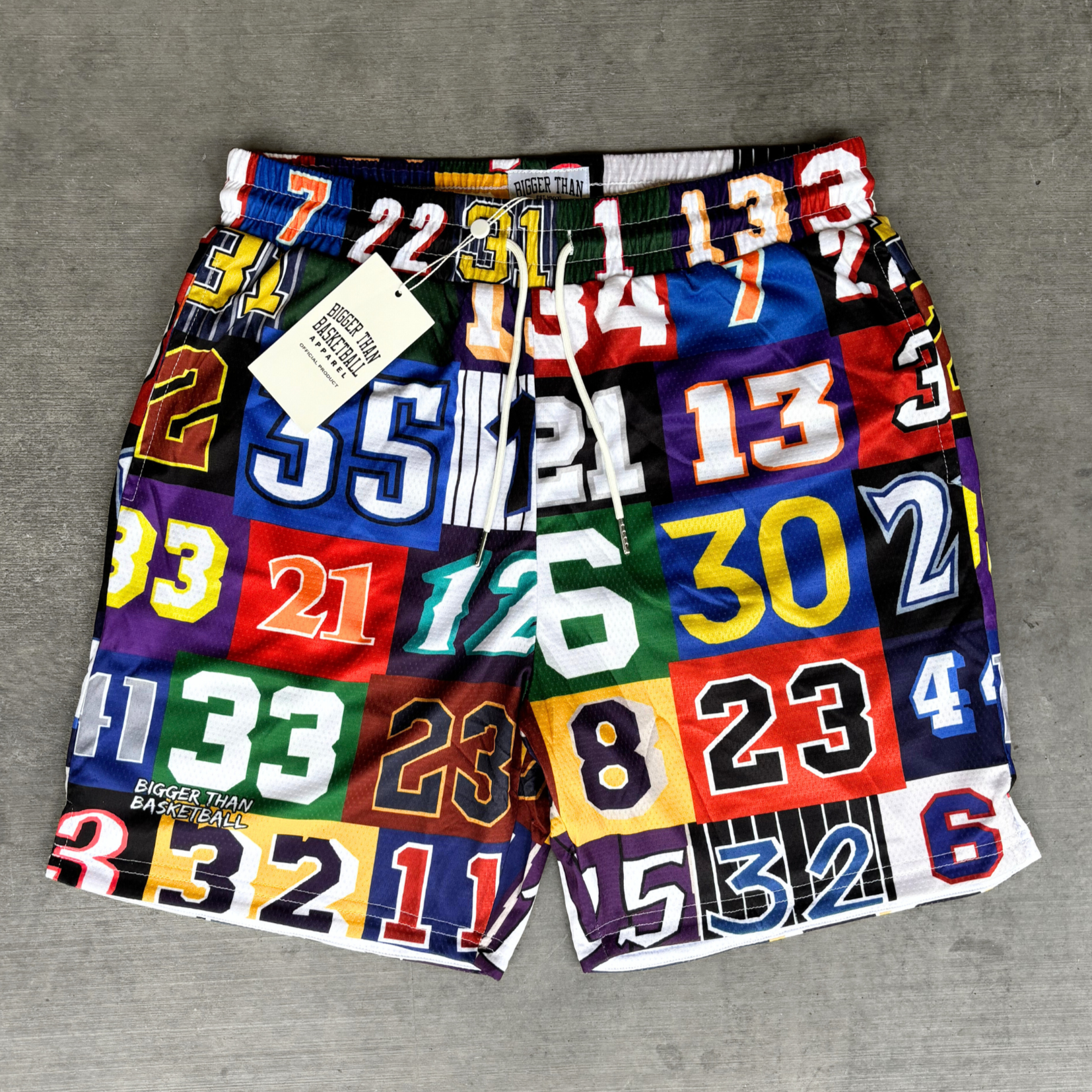 Collection of Colorful shorts with numbers on a gray background in a gallery layout