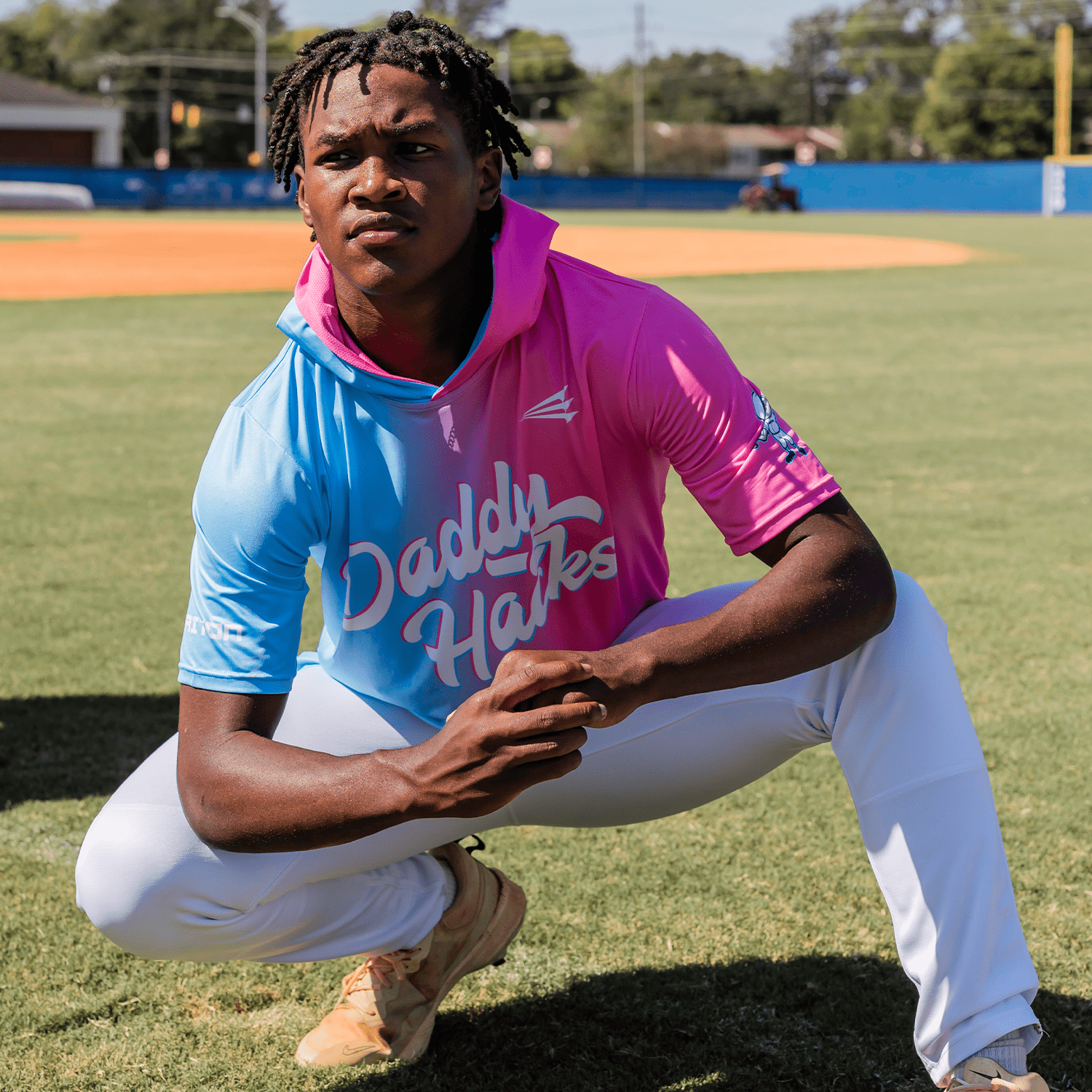 Collection of Person wearing a colorful daddy hacks short sleeve baseball hoodie in a gallery layout