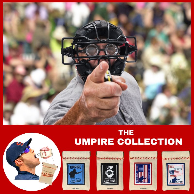 Person wearing an umpire mask with a crowd in the background, featuring 'The Umpire Collection' on a red banner.