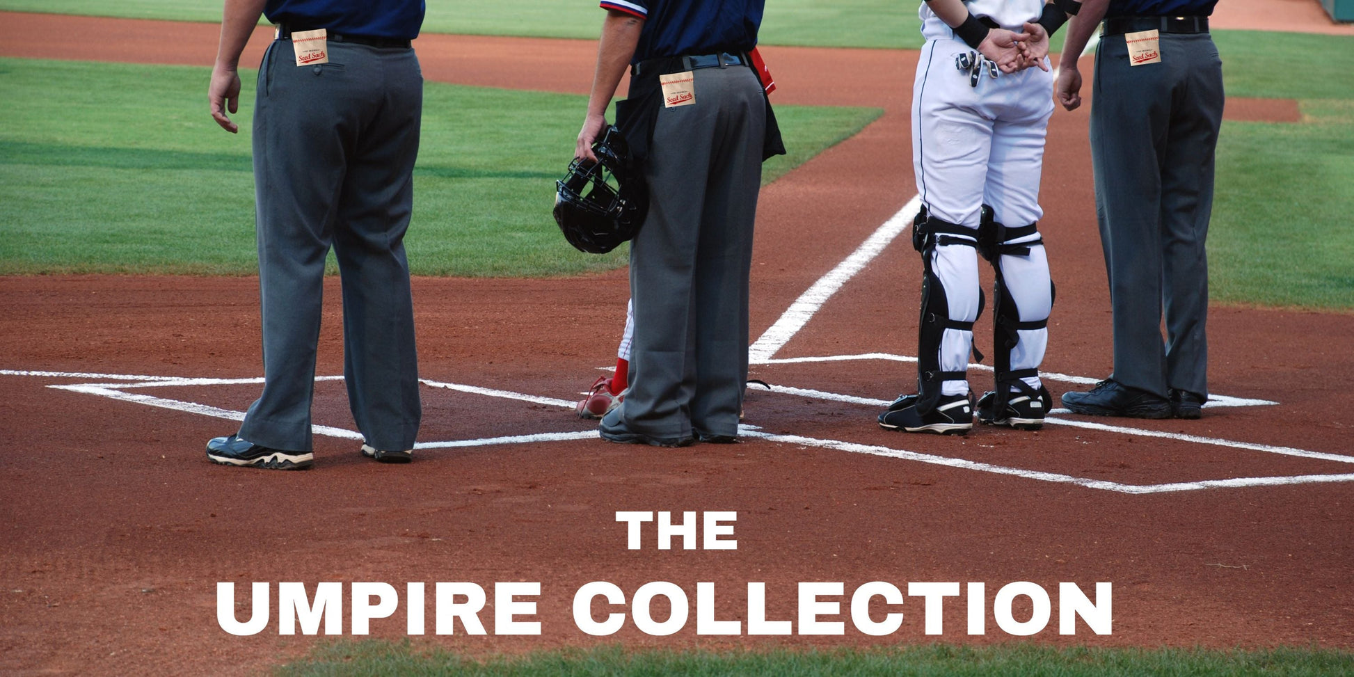 Baseball players and umpires on a field with 'The Umpire Collection' text overlay.