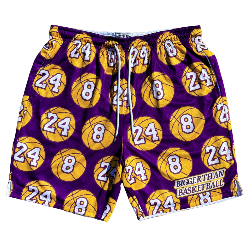 Purple shorts with yellow basketballs and numbers on a white background