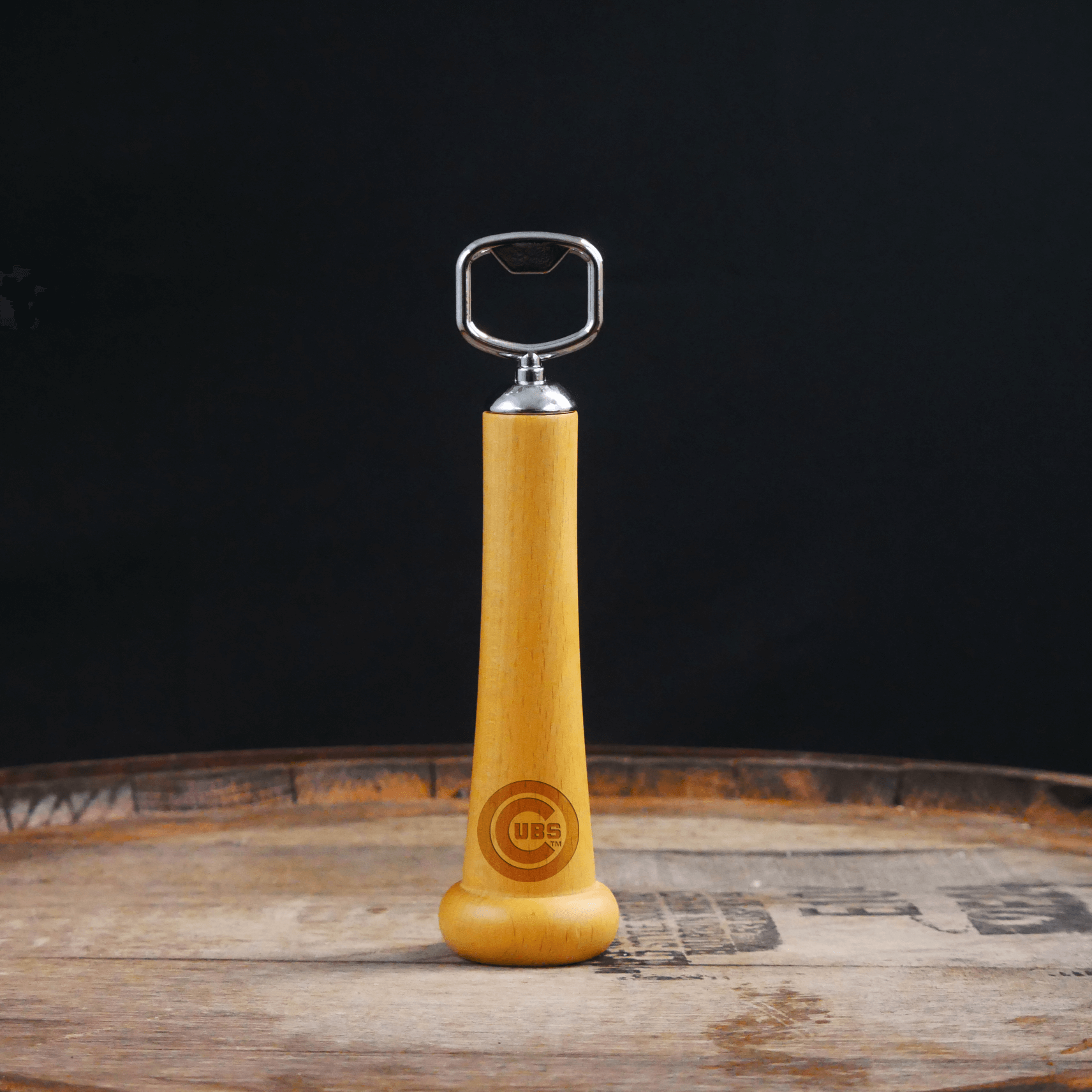 Collection of Wooden bottle opener with metal cap on a wooden surface in a gallery layout