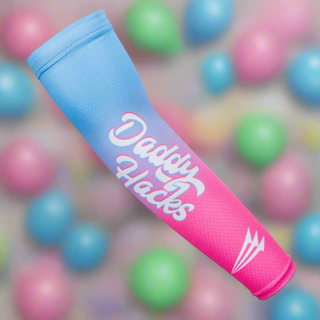 Collection of Pink and blue arm sleeve with 'Daddy Hacks' branding on a colorful ball background in a gallery layout