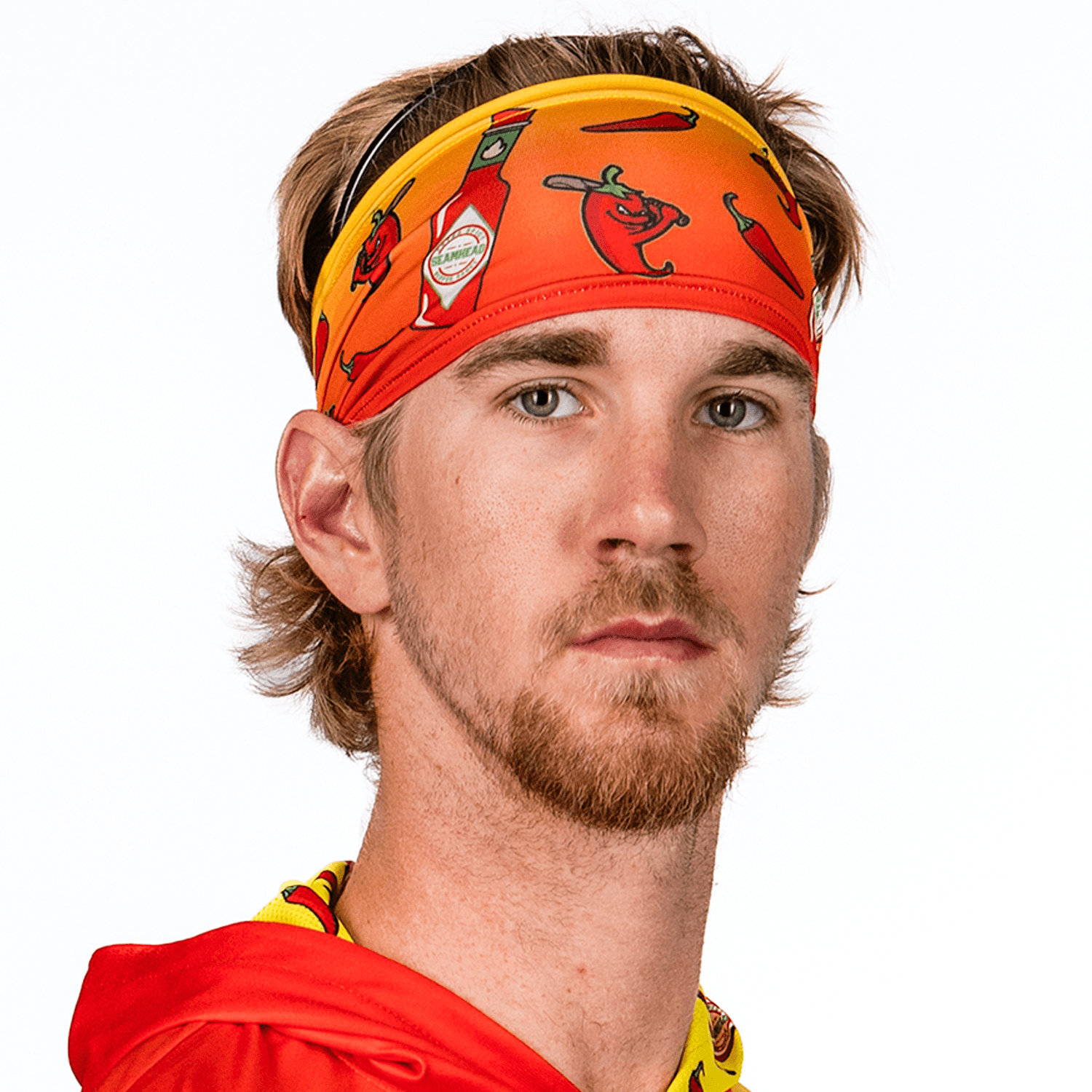 Collection of Man wearing a colorful headband with chili pepper design on a white background in a gallery layout