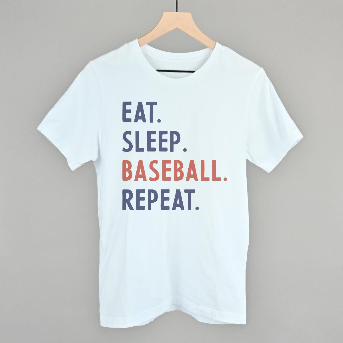 Collection of White t-shirt with 'EAT. SLEEP. BASEBALL. REPEAT.' text on a gray background in a gallery layout
