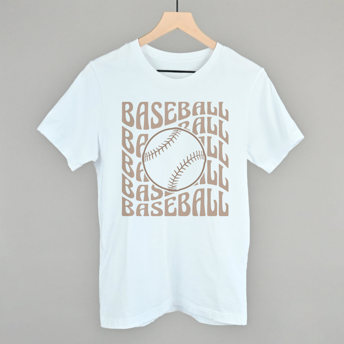 White t-shirt with 'BASEBALL' text and baseball graphic on a hanger against a gray background
