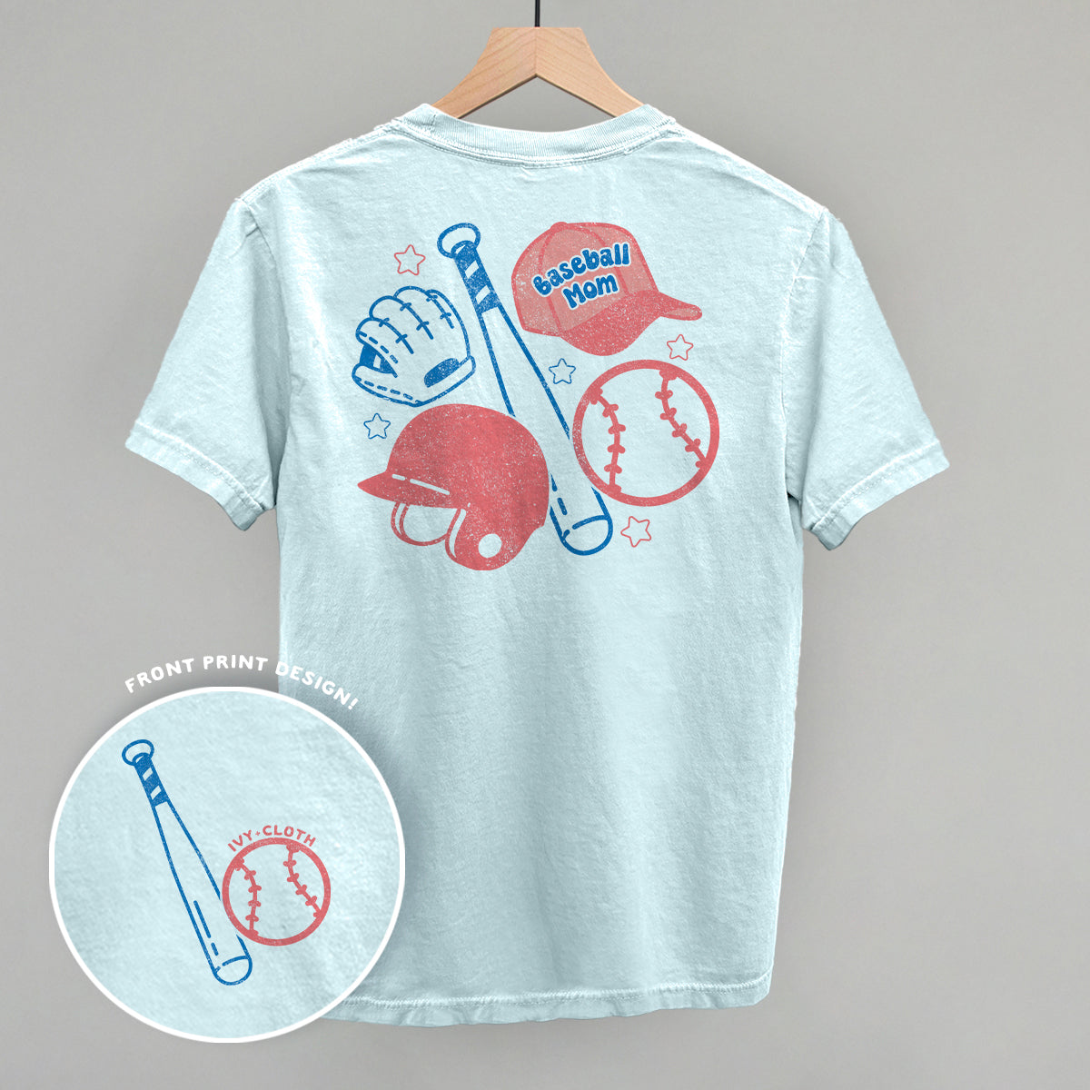 Light blue t-shirt with baseball-themed graphics on a gray background
