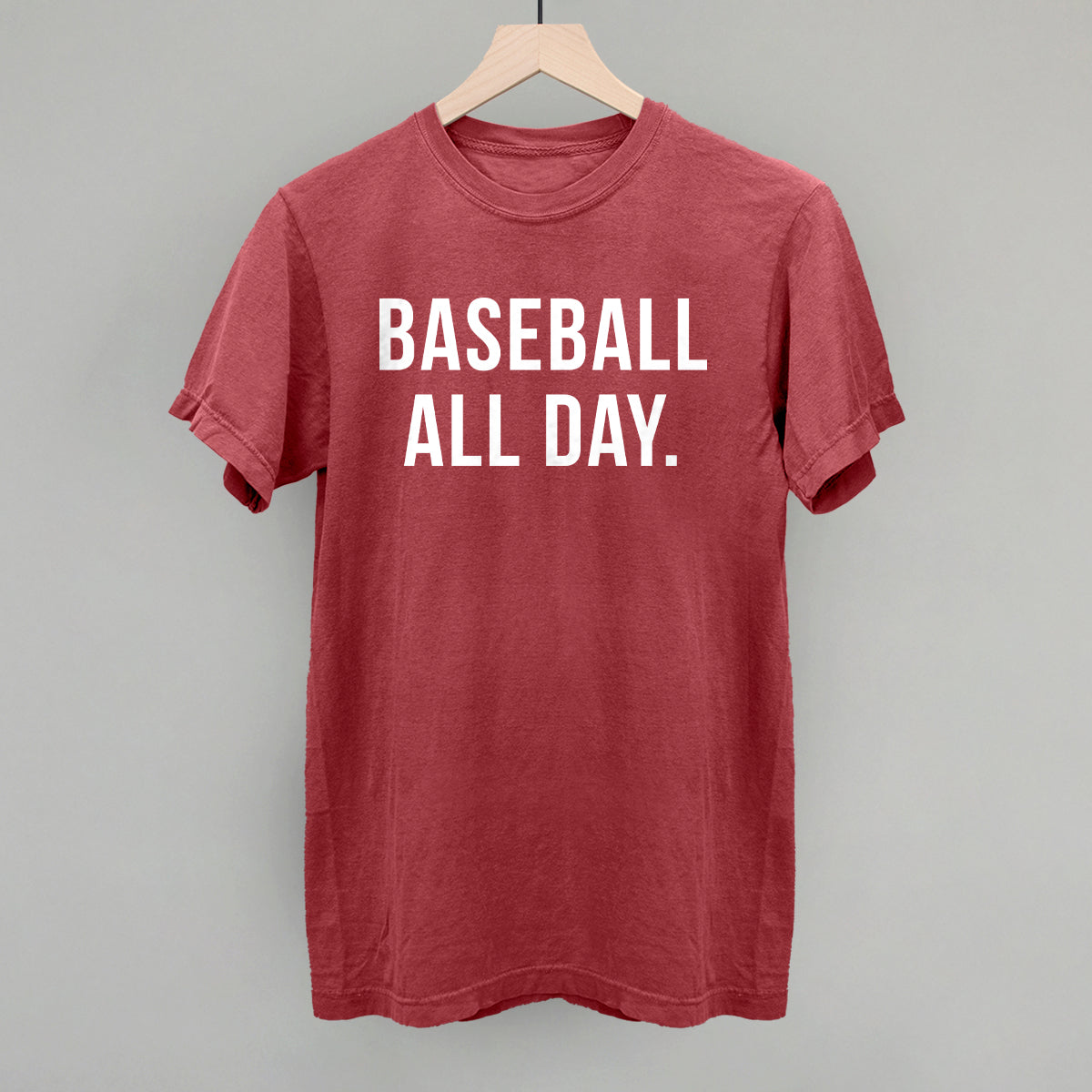 Red t-shirt with 'BASEBALL ALL DAY.' text on a gray background
