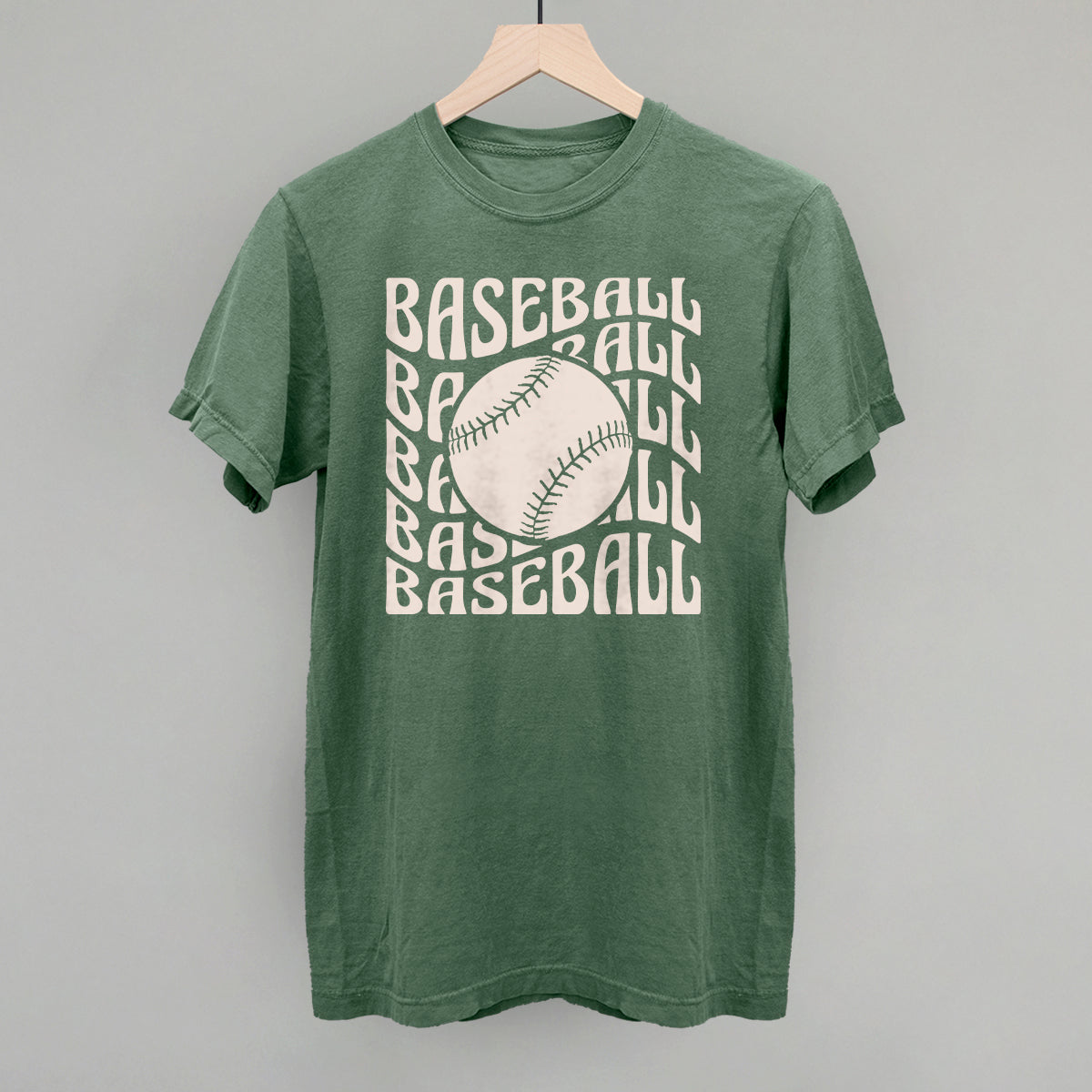 Collection of Green t-shirt with 'BASEBALL' text and a baseball graphic on a gray background in a gallery layout