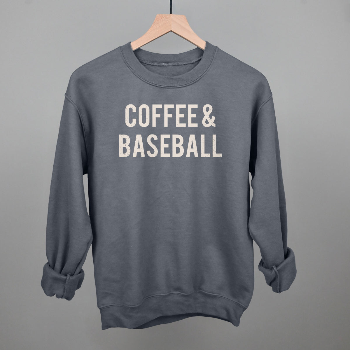 Gray comfort colors sweatshirt with 'COFFEE & BASEBALL' text on a gray background