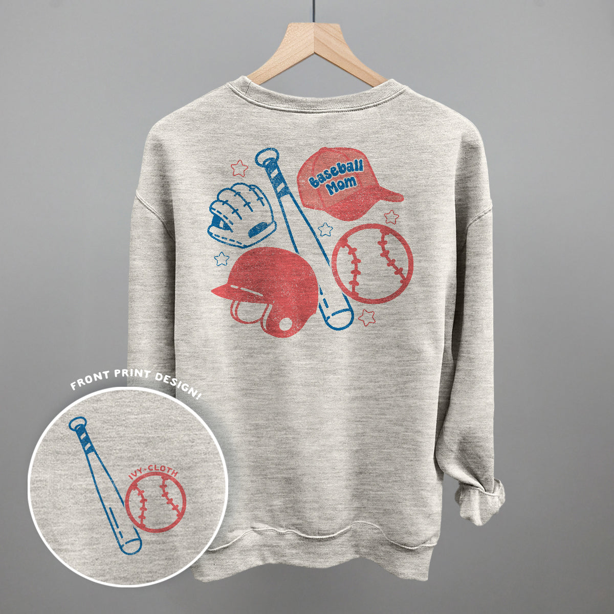 Gray sweatshirt with baseball-themed graphics on a hanger against a gray background