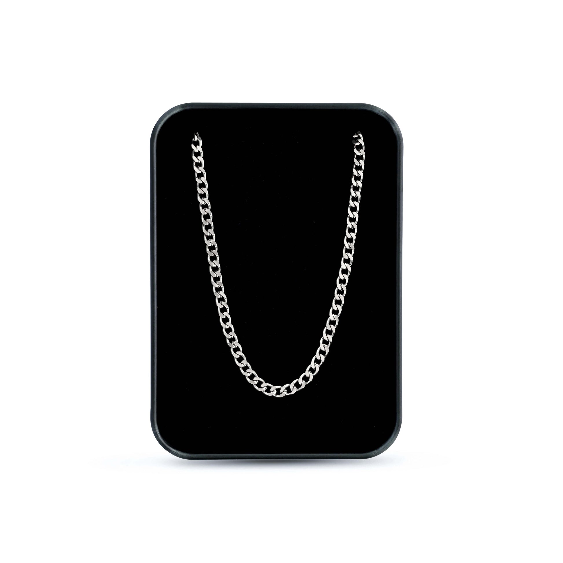 Silver chain on a black card with a white background