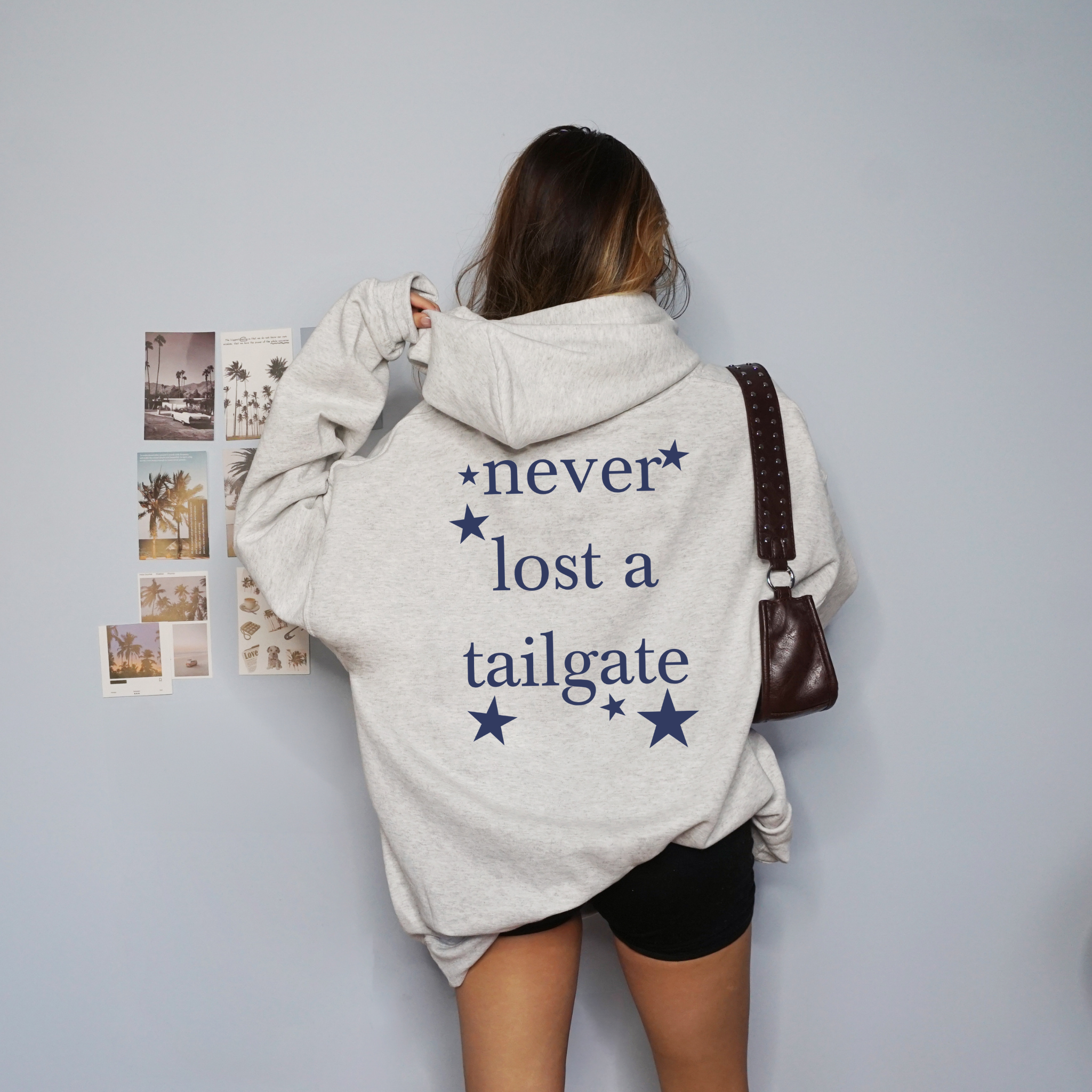 Collection of Never Lost A Tailgate Hooded Sweatshirt in a gallery layout