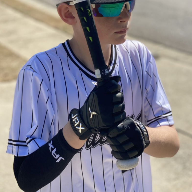 Collection of Baseball player in uniform holding a bat with sunglasses on, blurred background in a gallery layout