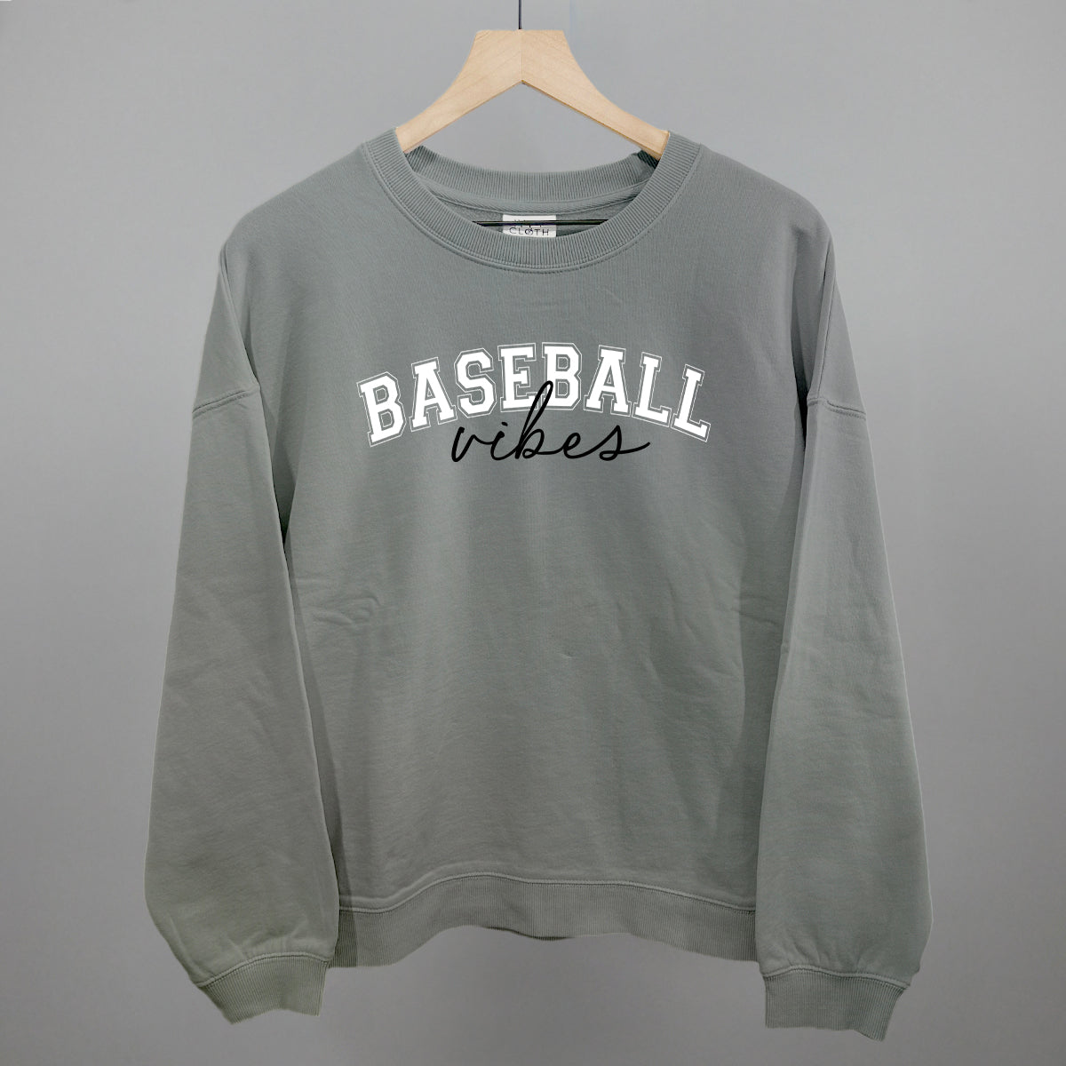 Collection of Smoke sweatshirt with 'BASEBALL vibes' text on a gray background in a gallery layout