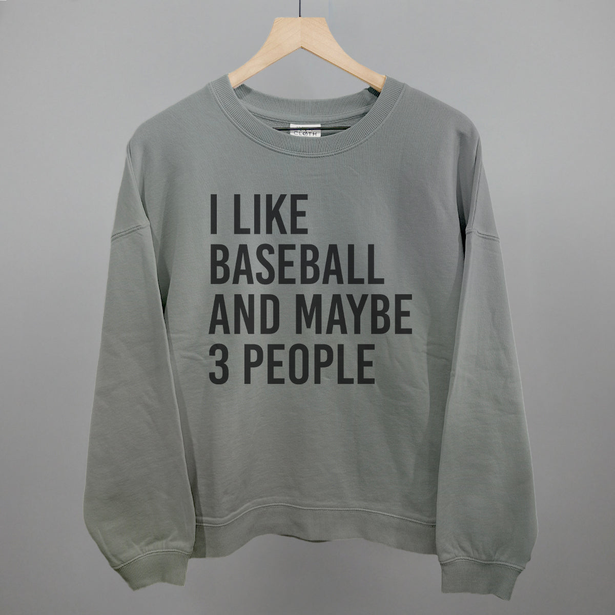 Collection of smoke sweatshirt with 'I LIKE BASEBALL AND MAYBE 3 PEOPLE' text on a gray background in a gallery layout