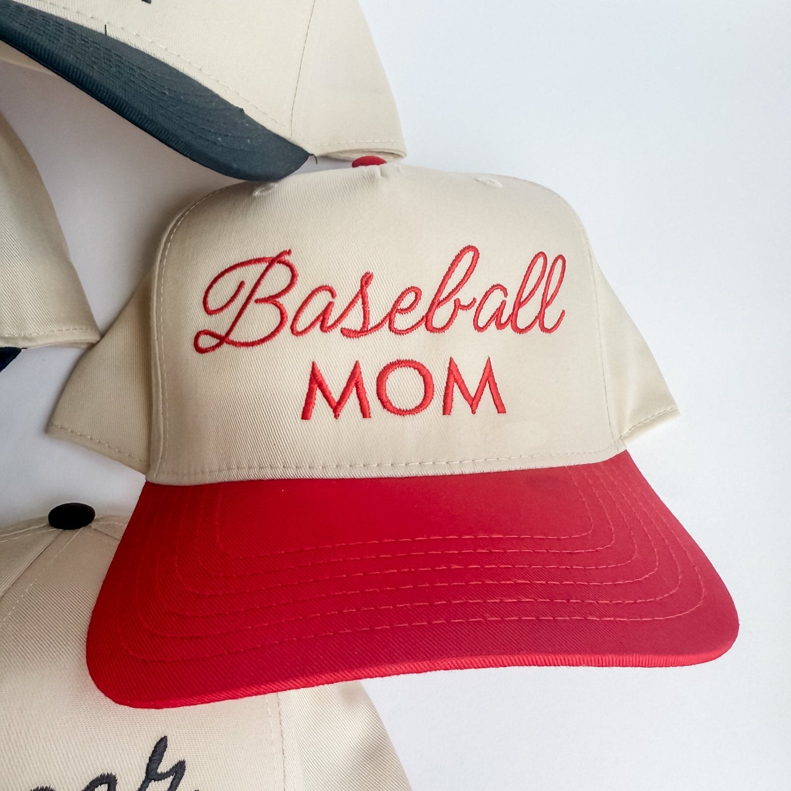 Baseball cap with 'Baseball Mom' text on a white background