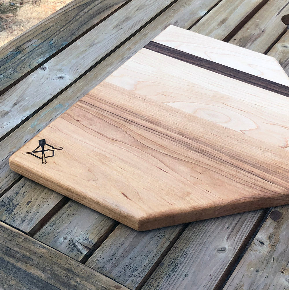 Collection of Wooden cutting board with a laser-cut baseball logo on a wooden surface in a gallery layout
