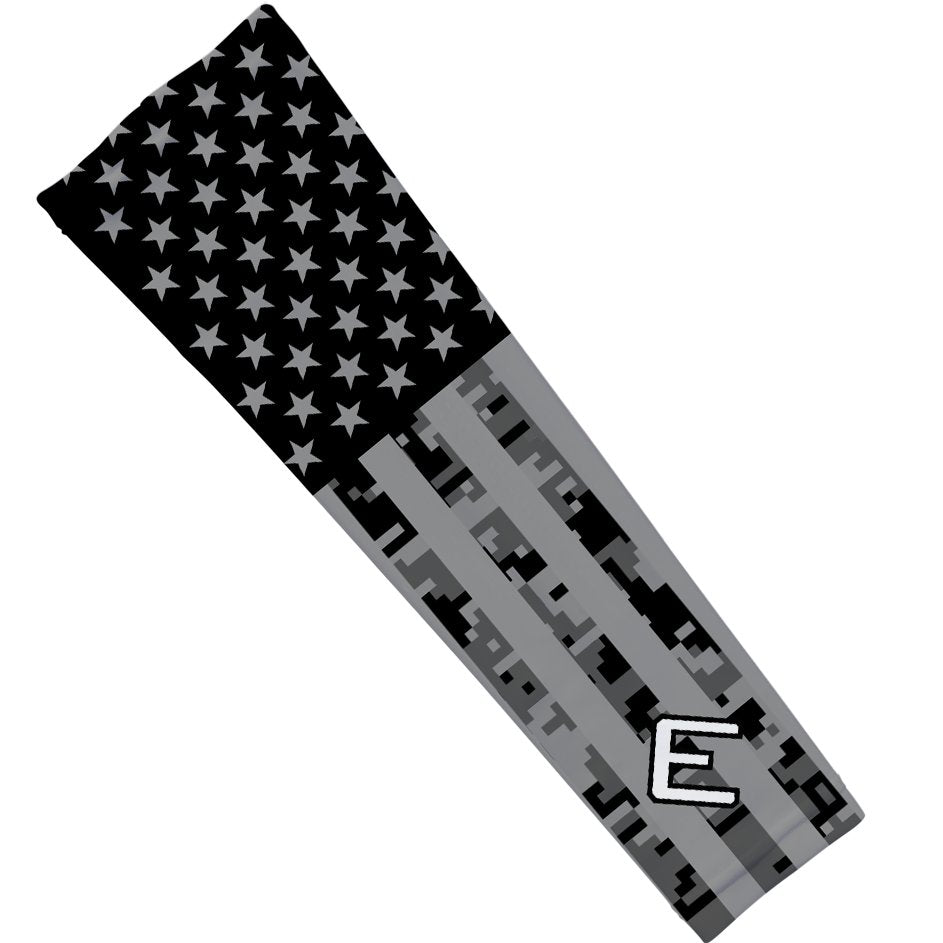 American flag with digital camouflage pattern and letter 'E' on a white background