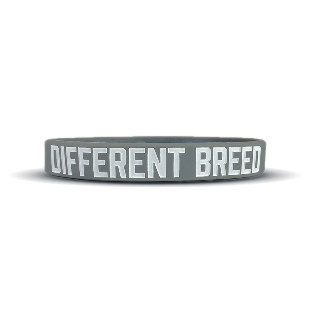 Collection of Gray wristband with 'DIFFERENT BREED' text on a white background in a gallery layout