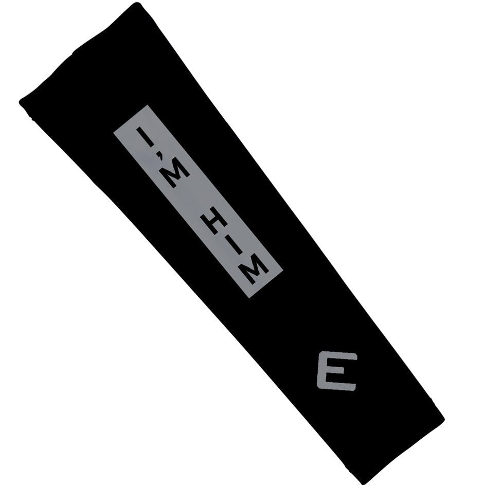 Collection of Black rectangular object with 'I'M HIM' text on a white background in a gallery layout