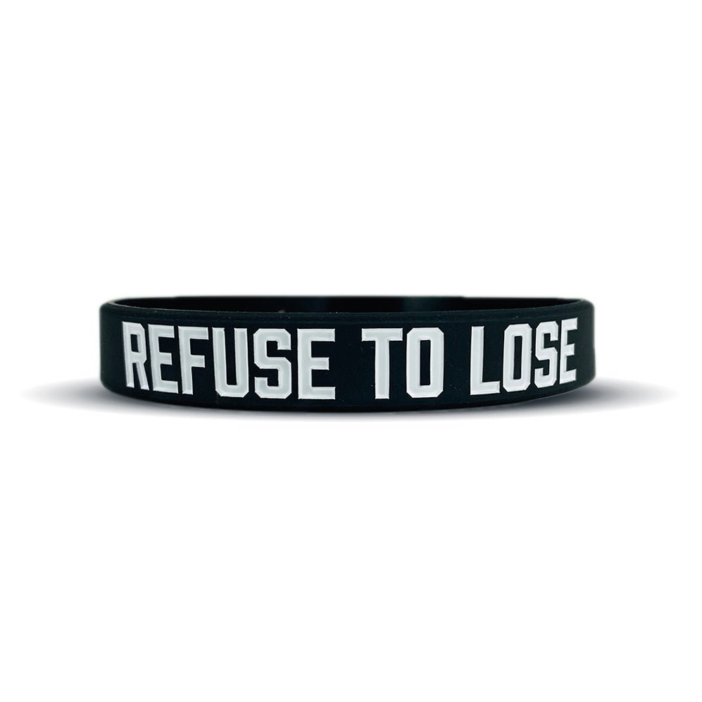 Black wristband with 'REFUSE TO LOSE' text on a white background